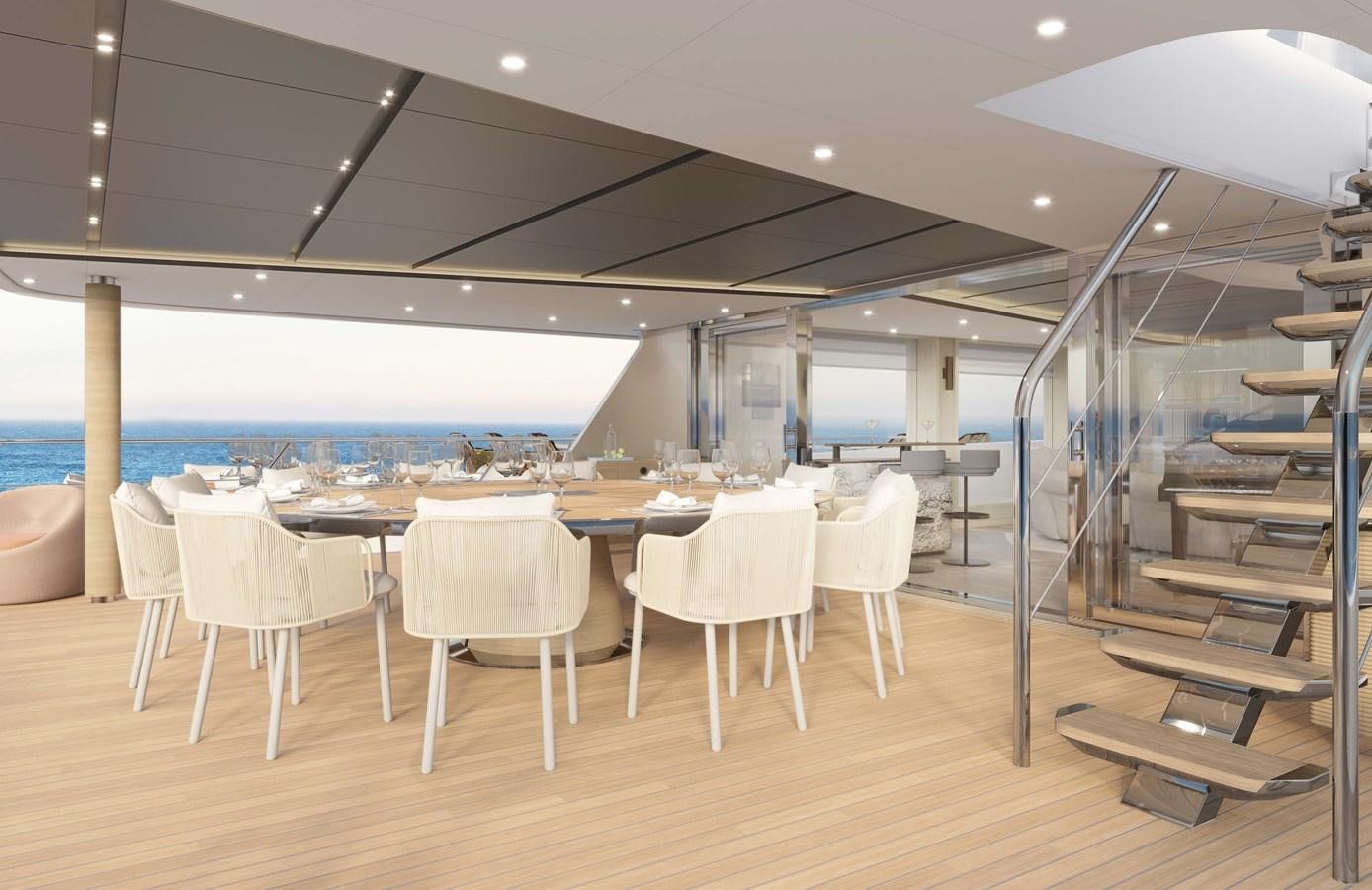 a room with tables and chairs aboard PROJECT SECRET Yacht for Sale