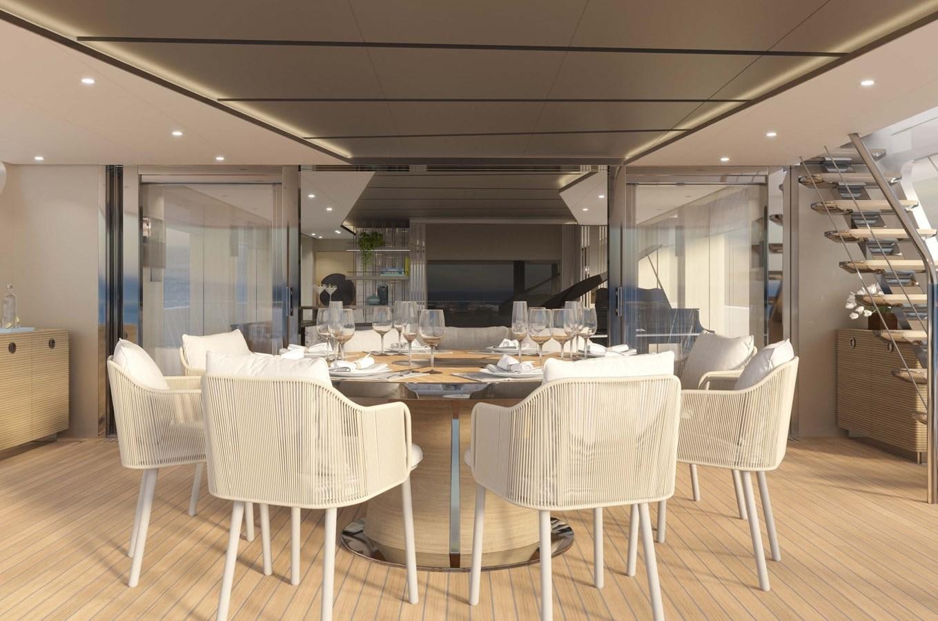 a large room with white tables and chairs aboard PROJECT SECRET Yacht for Sale