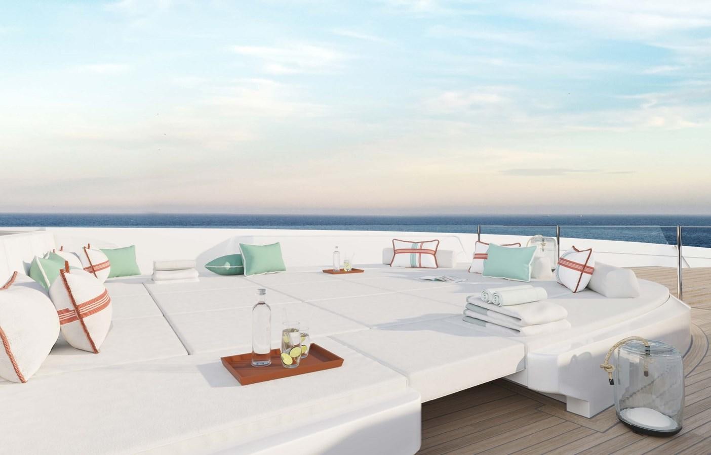 a room with a bed and chairs aboard PROJECT SECRET Yacht for Sale