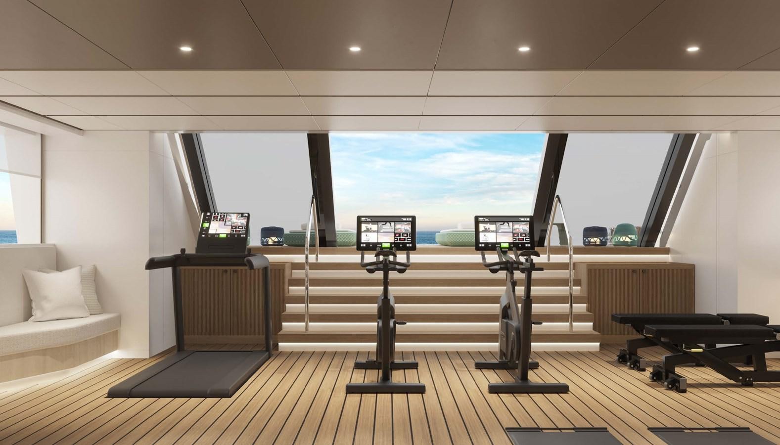 a room with a large window and a desk with a tv on it aboard PROJECT SECRET Yacht for Sale