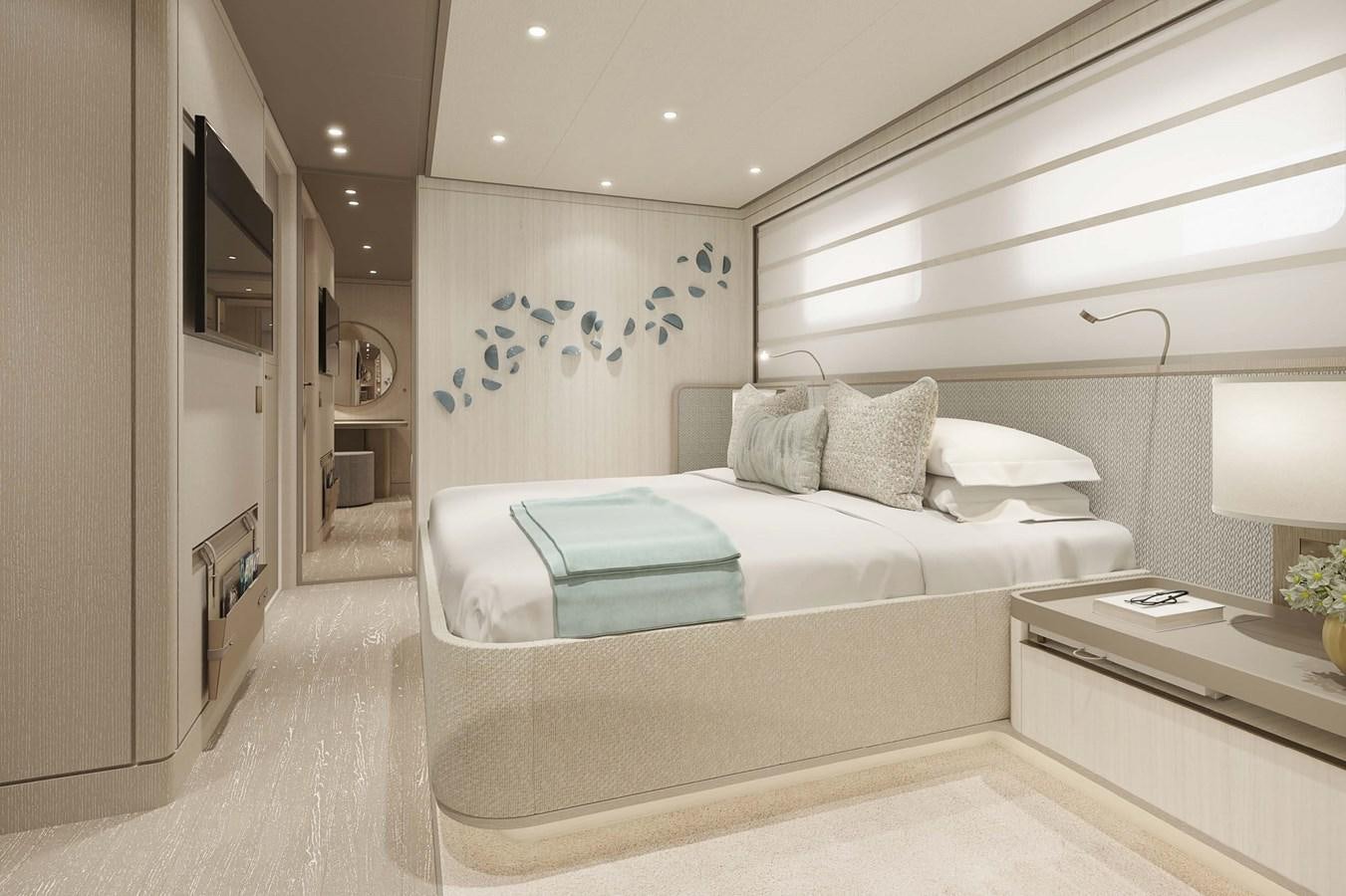 a bedroom with a bed and a desk aboard PROJECT SECRET Yacht for Sale