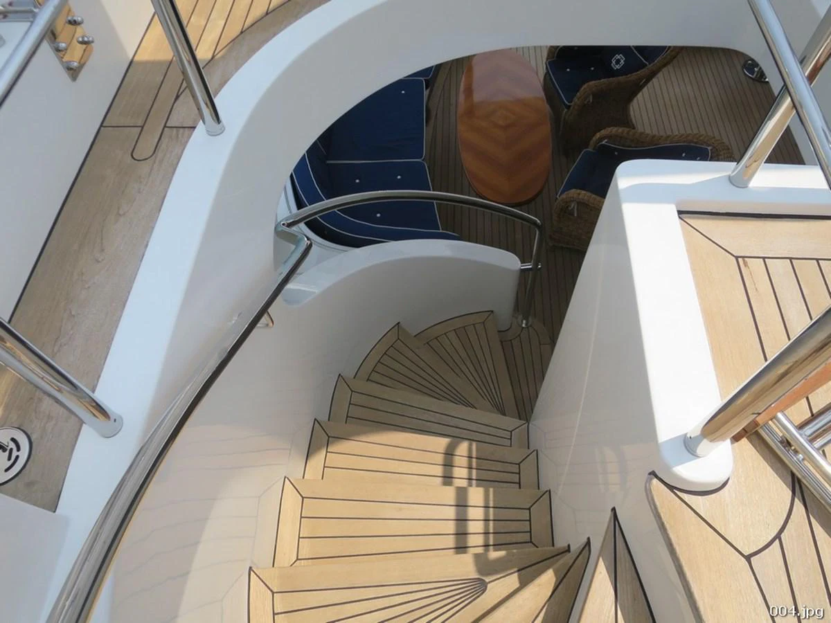 a staircase with a set of stairs aboard BLU Yacht for Sale