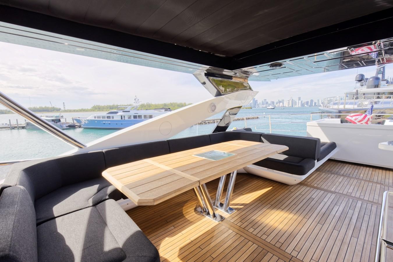 a table on a deck aboard XSK06864H718 Yacht for Sale