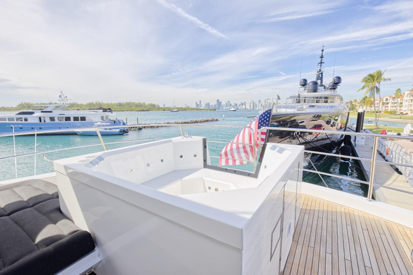 a boat with flags on it aboard XSK06864H718 Yacht for Sale