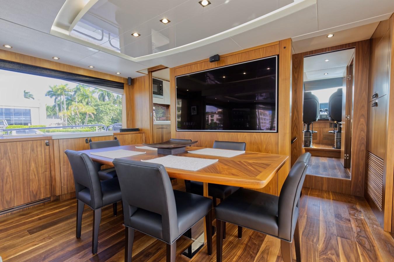 a room with a table and chairs aboard XSK06864H718 Yacht for Sale