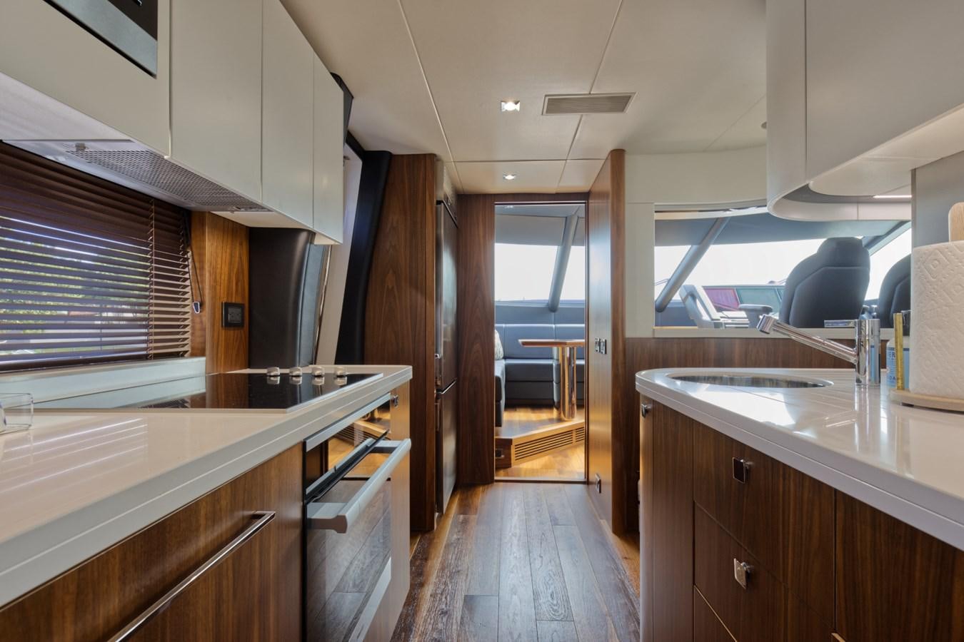 a kitchen with a wood floor aboard XSK06864H718 Yacht for Sale