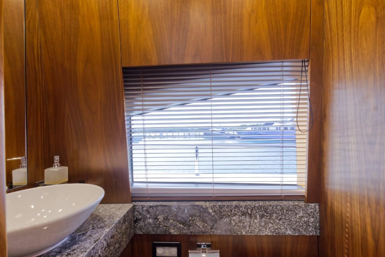 a bathroom with a sink and a large window aboard XSK06864H718 Yacht for Sale
