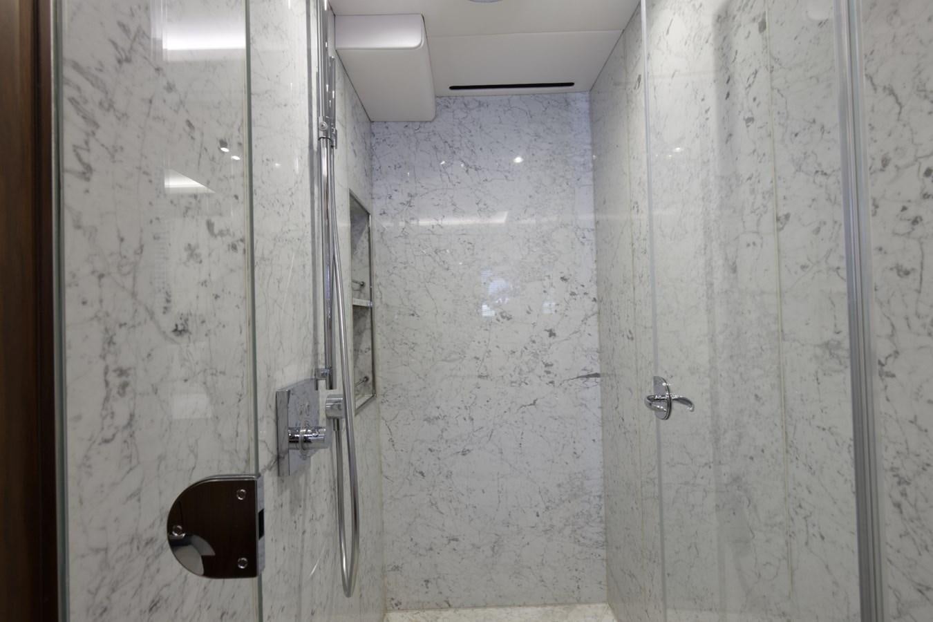 a bathroom with a toilet and a tissue roll aboard XSK06864H718 Yacht for Sale