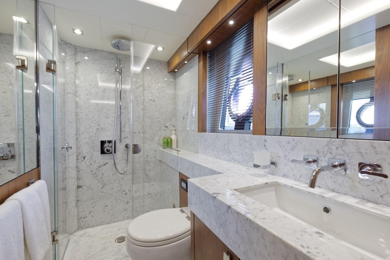 a bathroom with a glass shower aboard XSK06864H718 Yacht for Sale