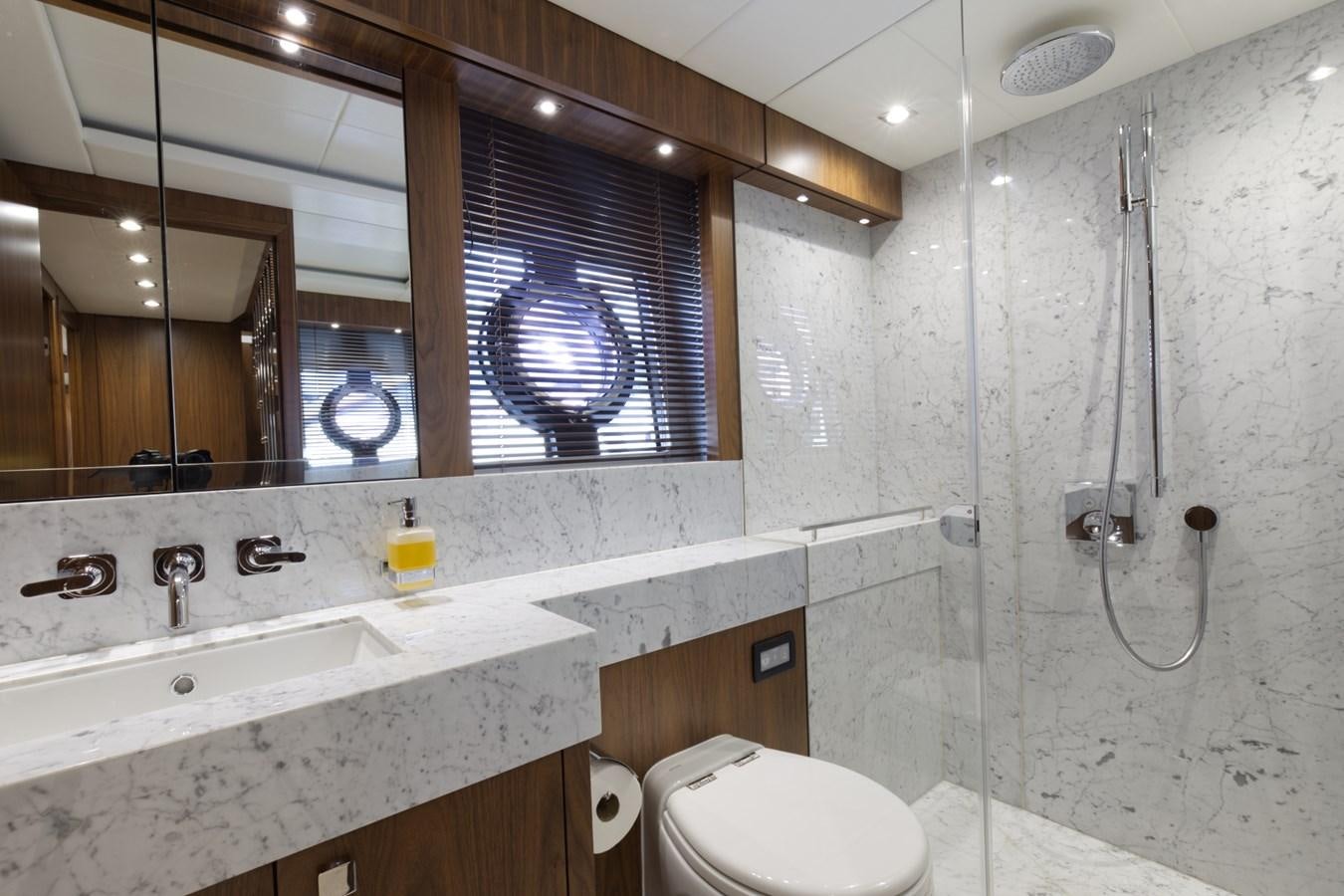 a bathroom with a glass shower aboard XSK06864H718 Yacht for Sale
