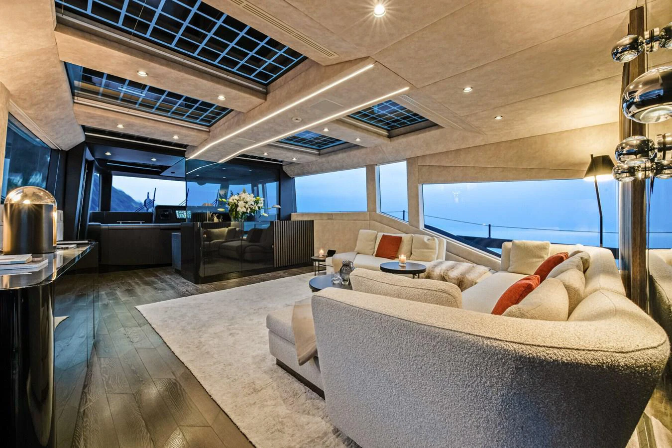 a living room with a large window aboard MARTITA Yacht for Sale
