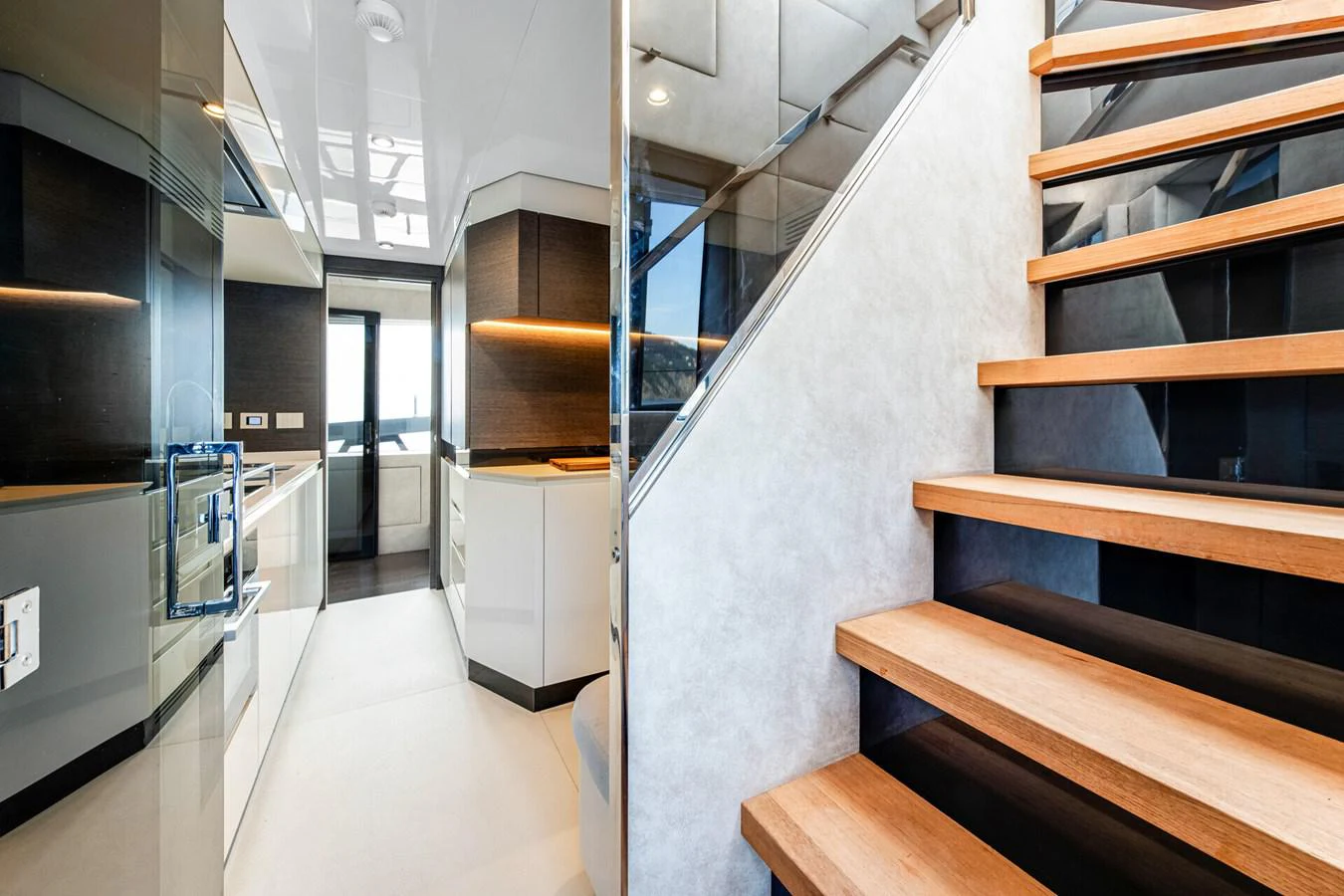 a room with a few wooden stairs aboard MARTITA Yacht for Sale