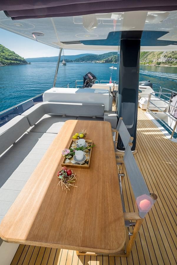 a table on a boat aboard AVVENTURA Yacht for Sale