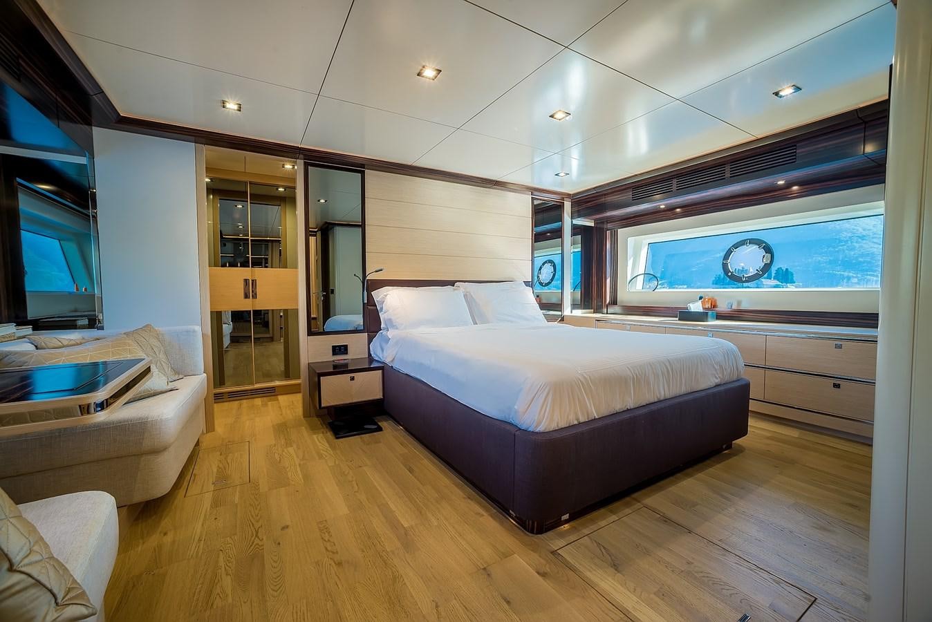 a bedroom with a large bed aboard AVVENTURA Yacht for Sale