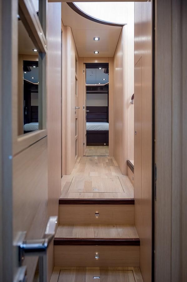 a hallway with doors aboard AVVENTURA Yacht for Sale