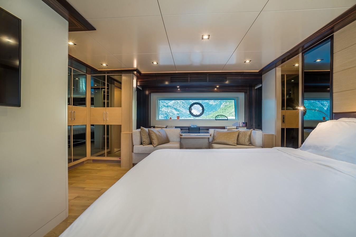 a large bed in a room aboard AVVENTURA Yacht for Sale