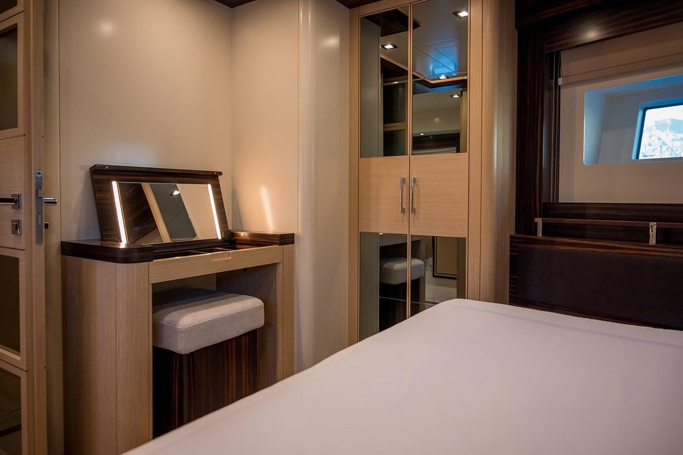 a bed sits in a room aboard AVVENTURA Yacht for Sale