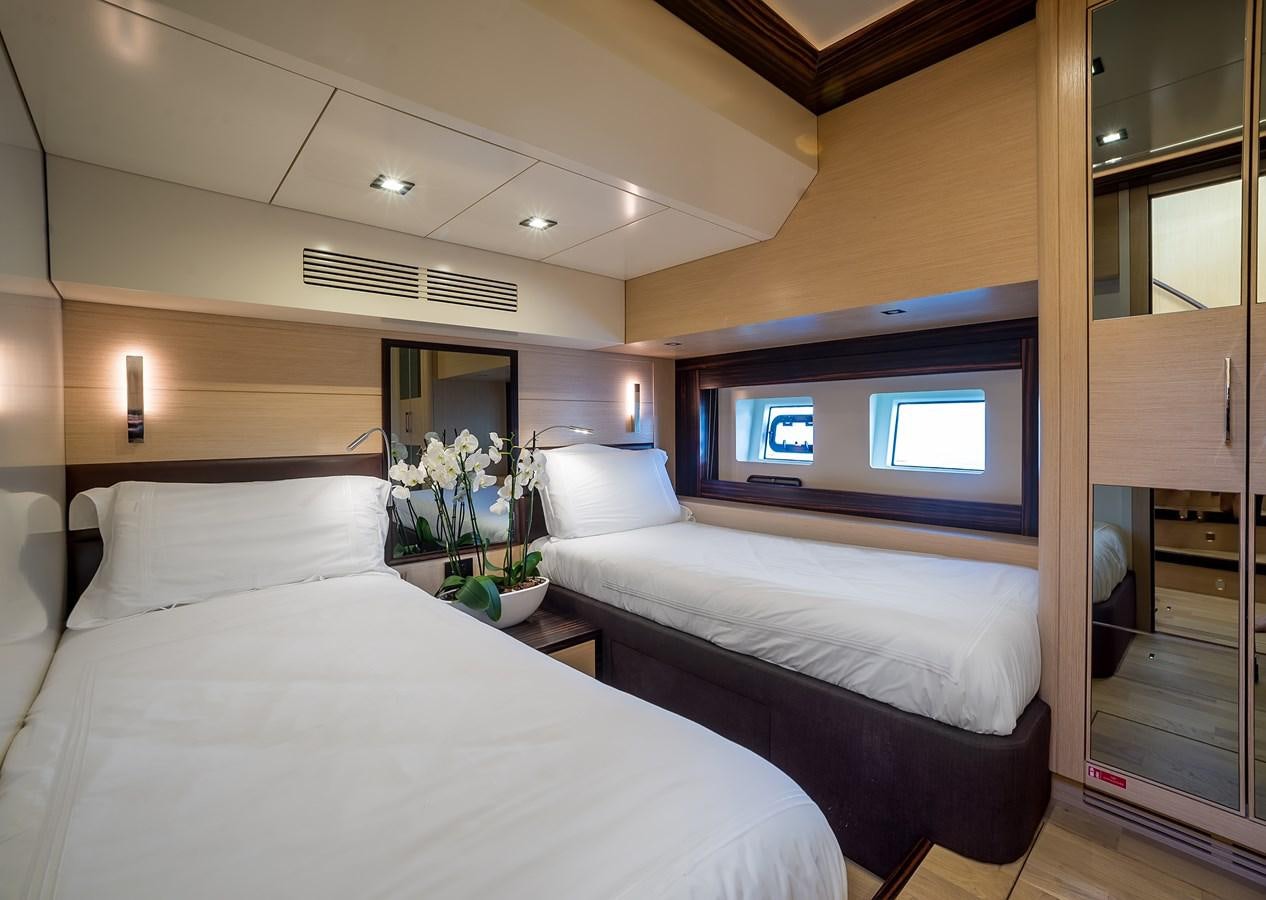 a room with two beds aboard AVVENTURA Yacht for Sale