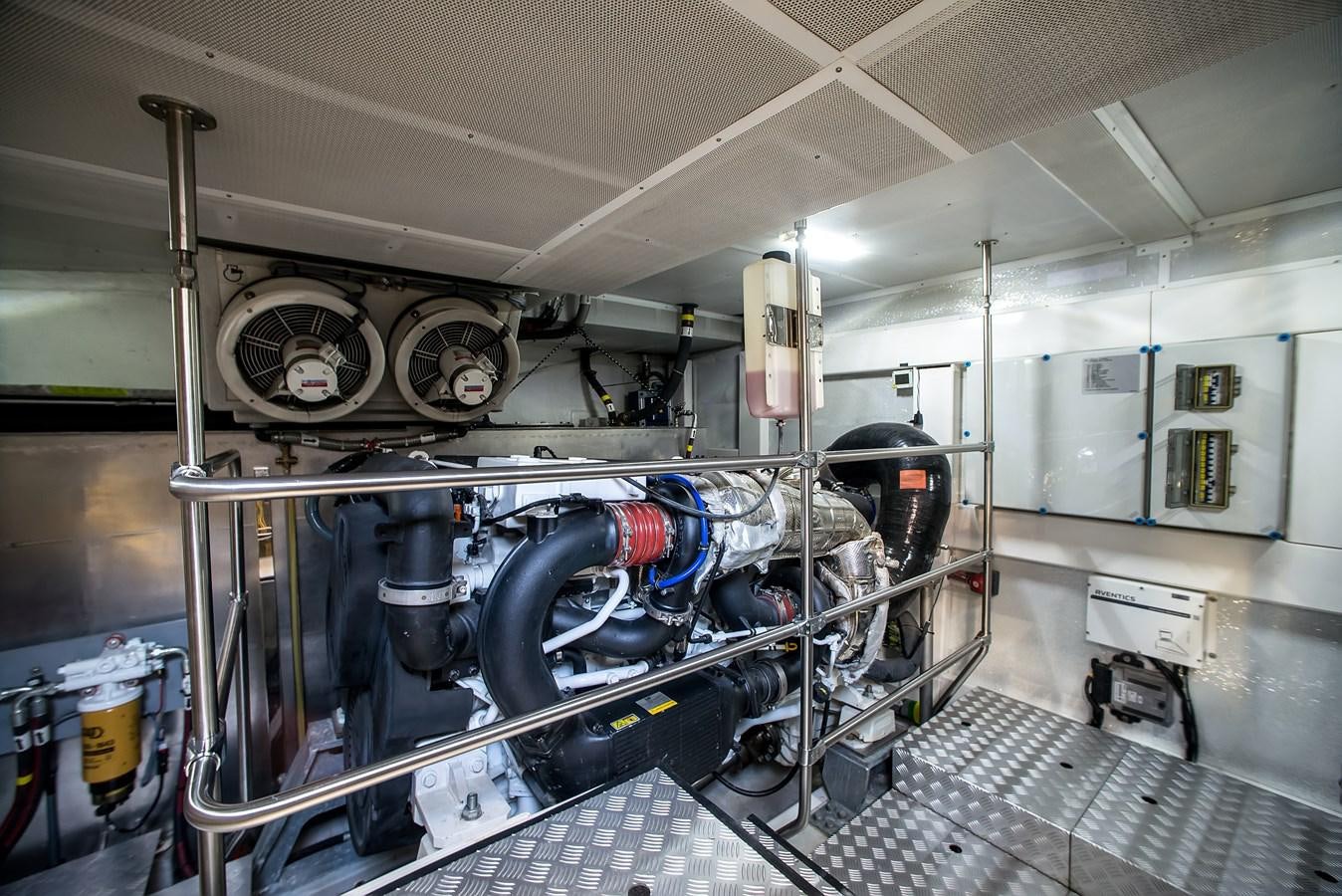 a large machine in a factory aboard AVVENTURA Yacht for Sale