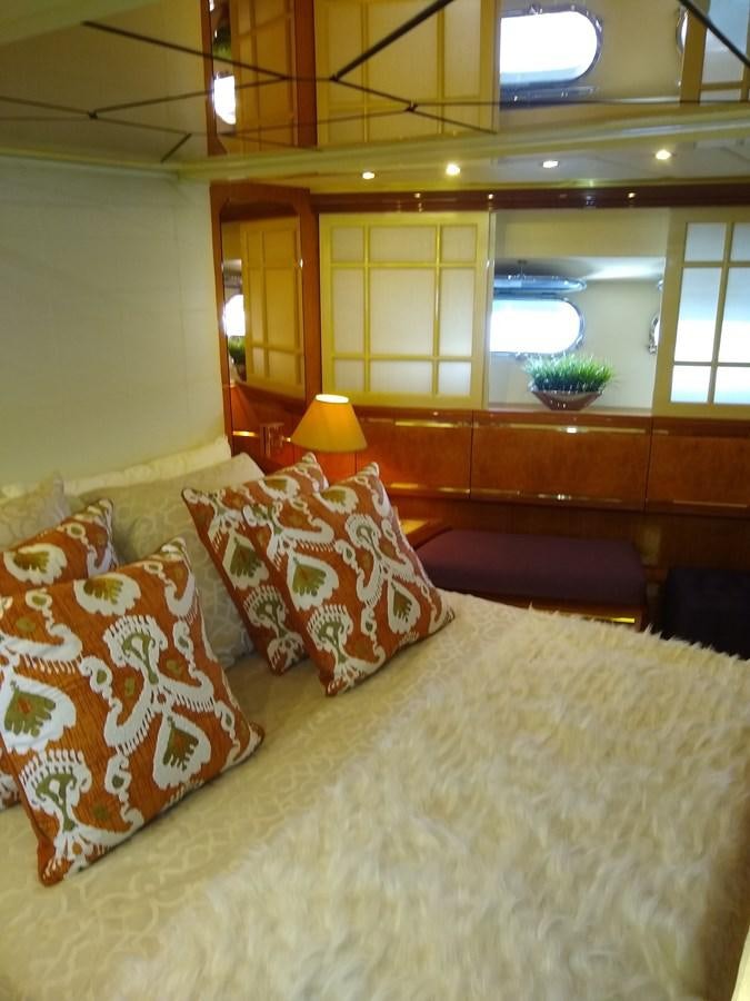 a bed with pillows and pillows aboard ALCHEMIST Yacht for Sale