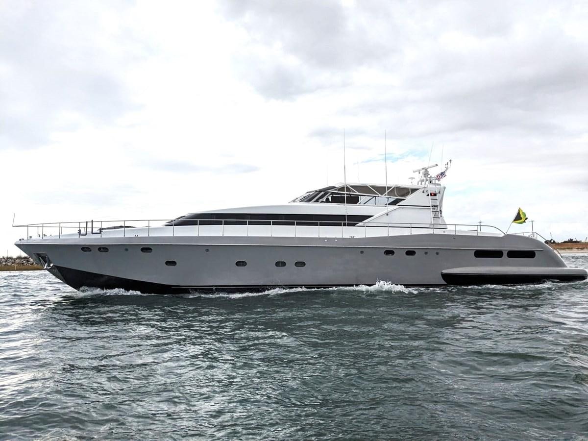 a white yacht on the water aboard ALCHEMIST Yacht for Sale