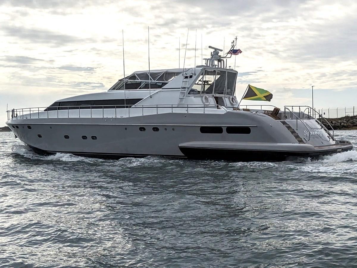 a white yacht in the water aboard ALCHEMIST Yacht for Sale