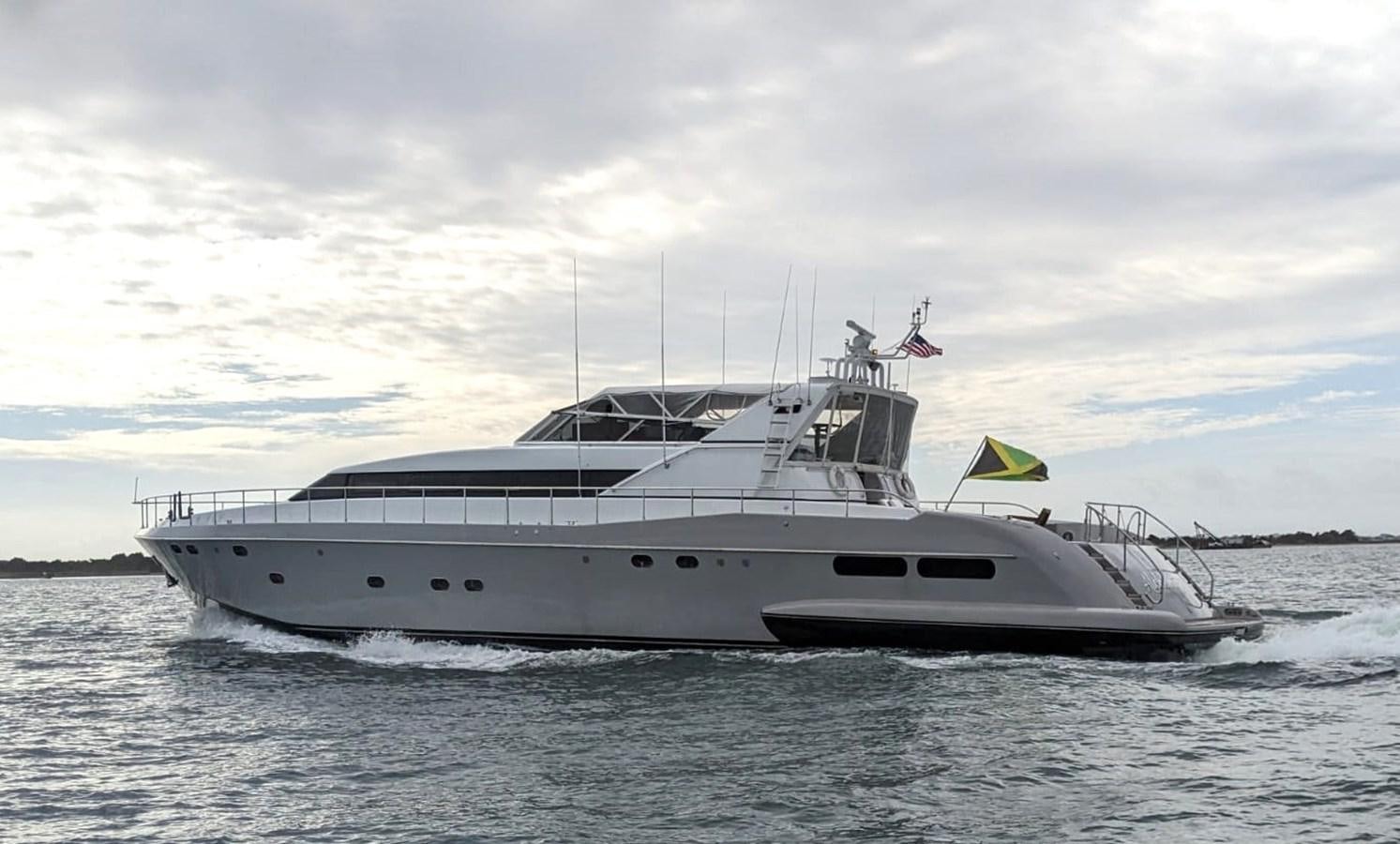 a white yacht on the water aboard ALCHEMIST Yacht for Sale