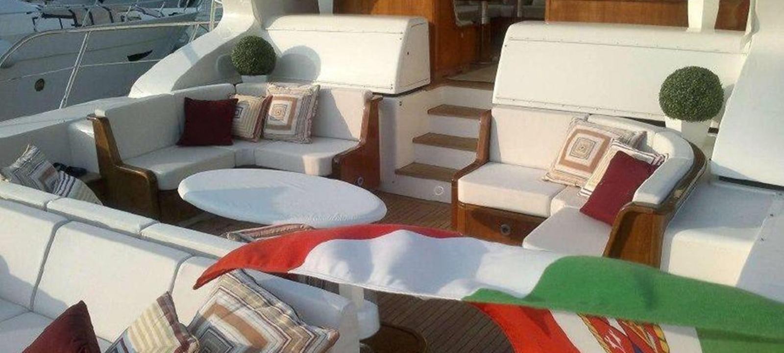 a room with a couch and a table aboard VARUNA Yacht for Sale