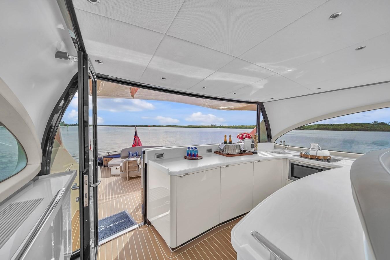 a room with a view of the ocean and the land aboard MADDAMC2 Yacht for Sale