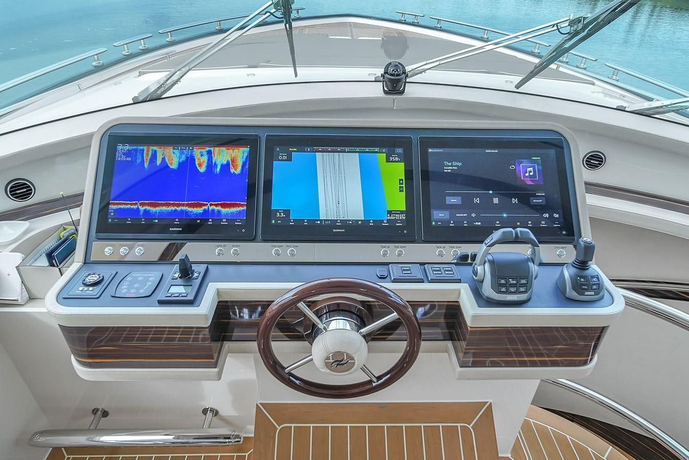 a control panel of a car aboard MADDAMC2 Yacht for Sale