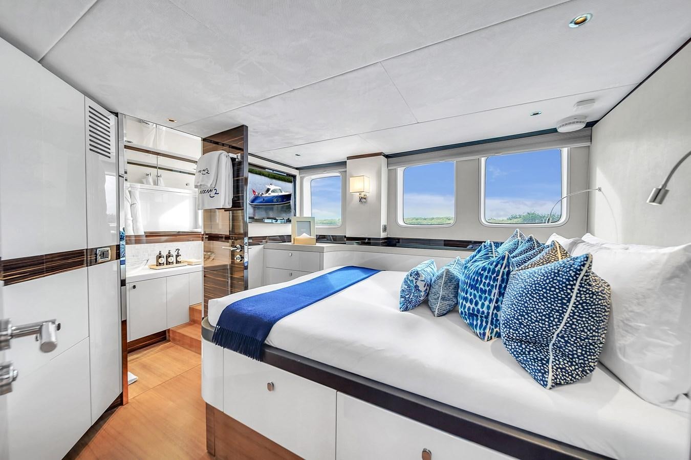 a room with a bed and a window aboard MADDAMC2 Yacht for Sale