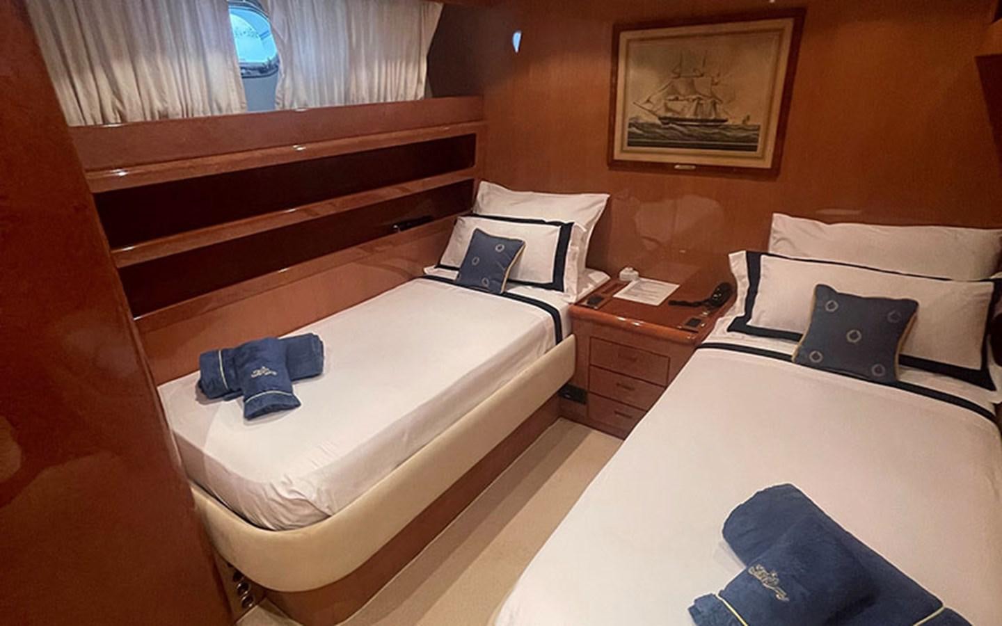 a couple of beds in a hotel room aboard IT'S A DREAM Yacht for Sale