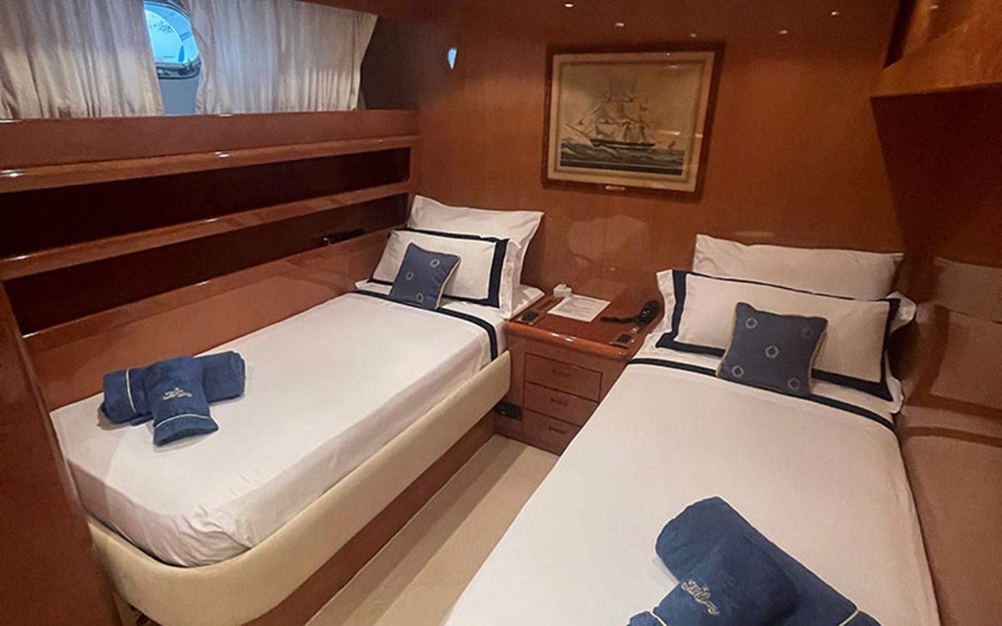 a couple of beds in a room aboard IT'S A DREAM Yacht for Sale