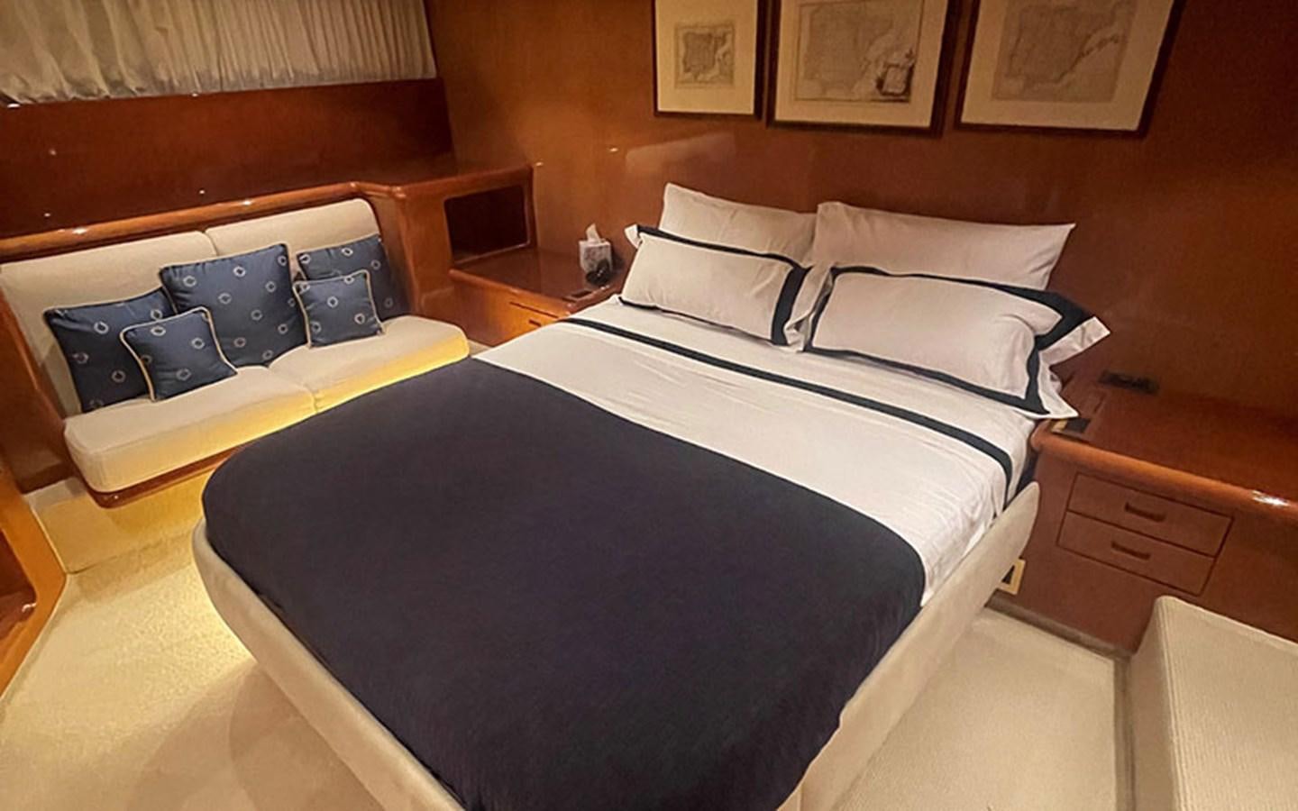 a room with a bed and a desk aboard IT'S A DREAM Yacht for Sale