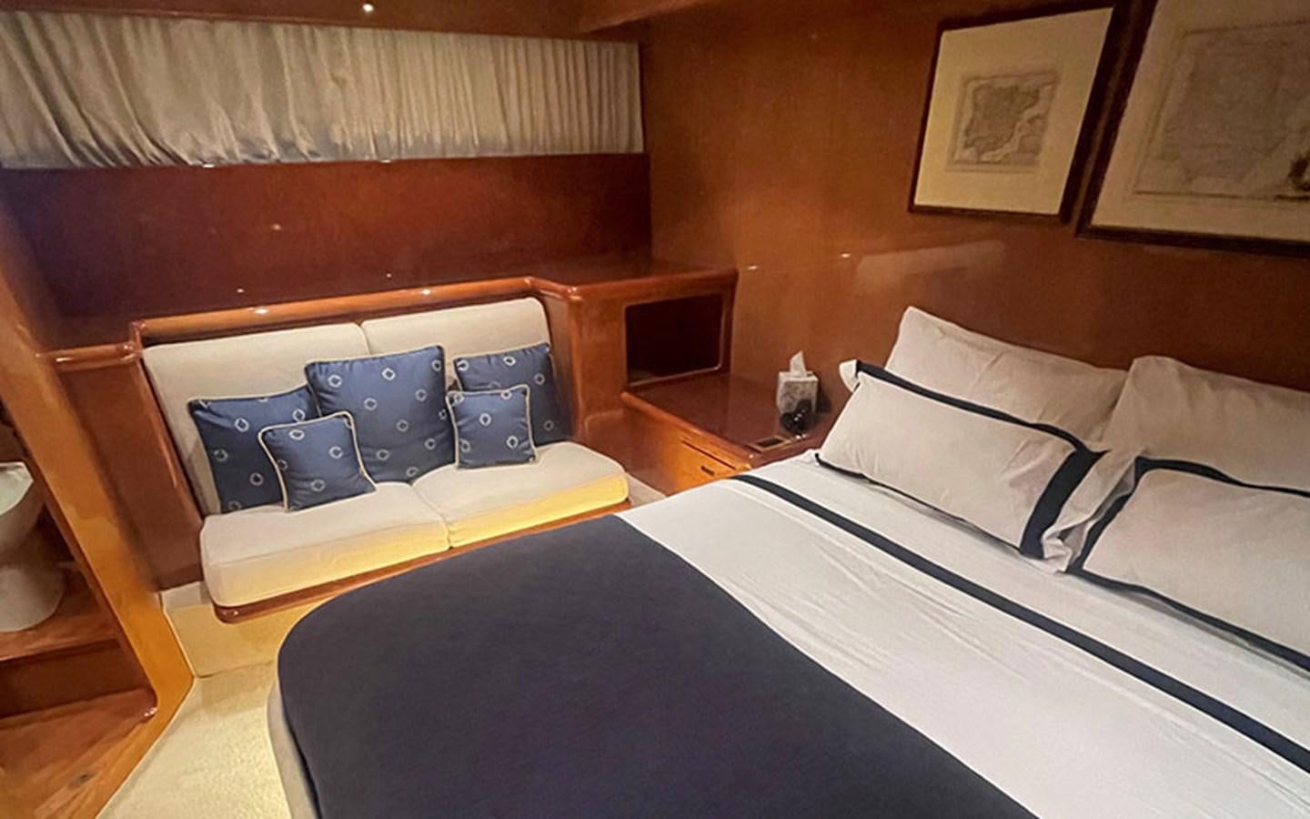 a room with a bed and a couch aboard IT'S A DREAM Yacht for Sale