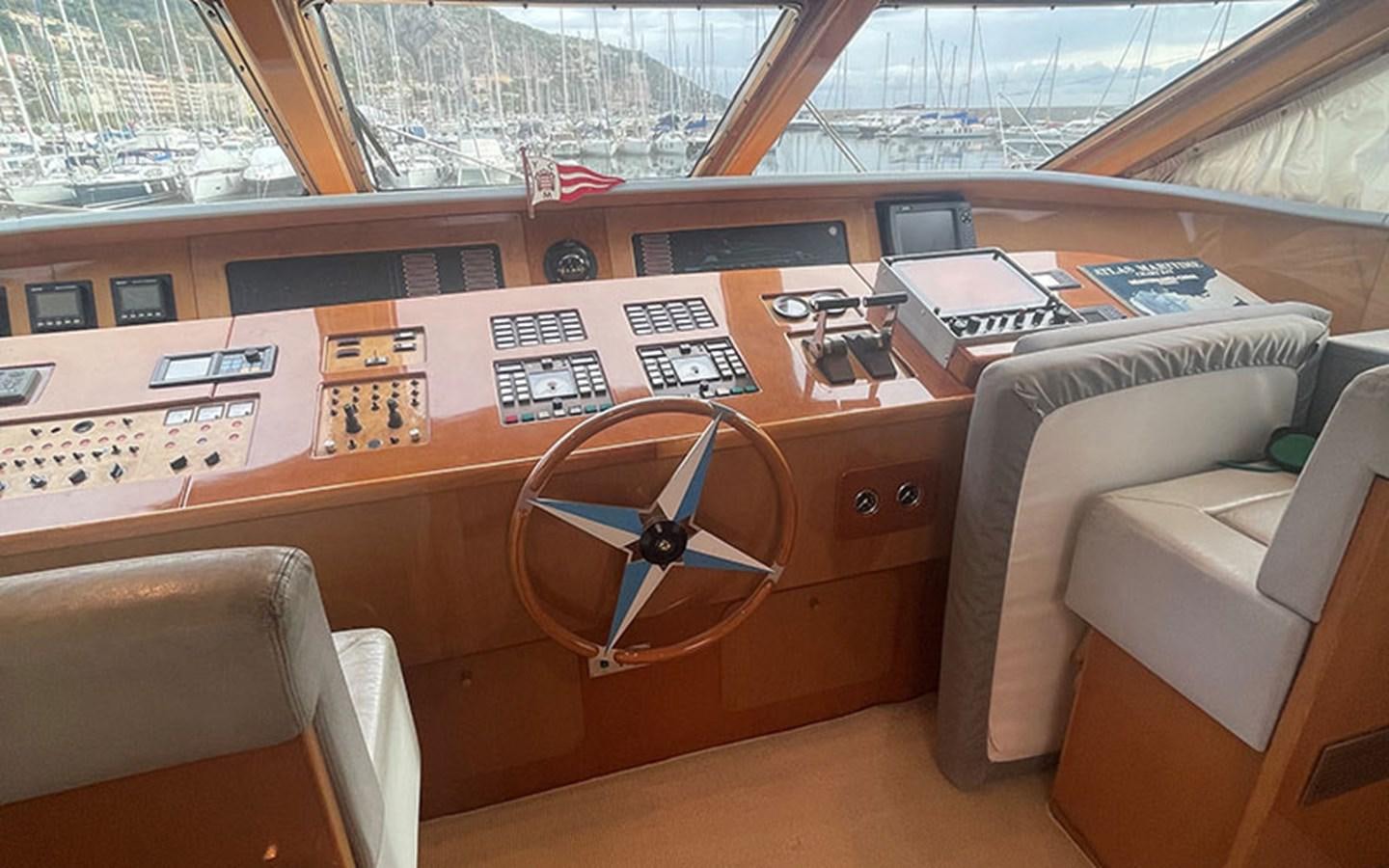a room with a table and chairs aboard IT'S A DREAM Yacht for Sale