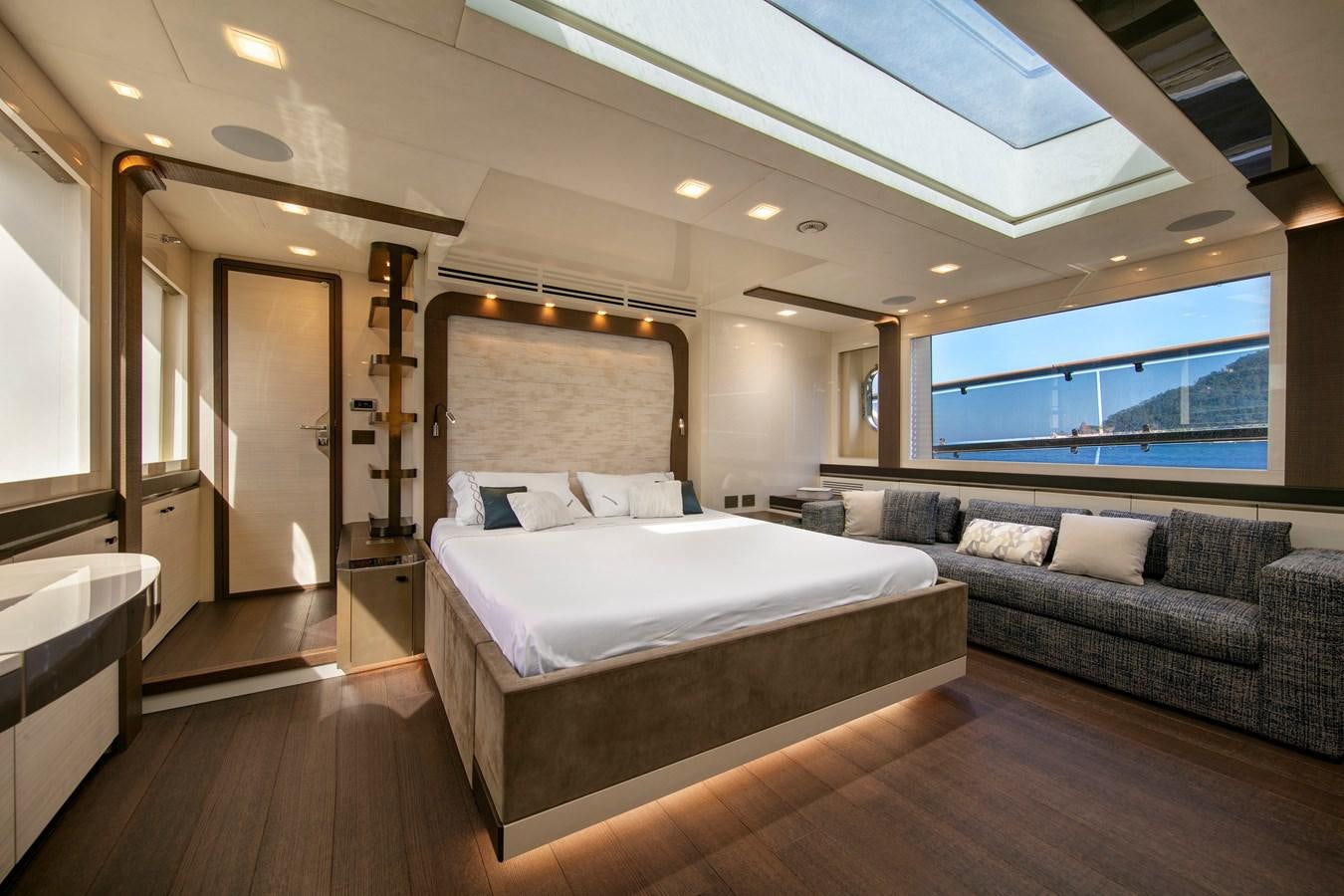 a large bedroom with a large bed aboard ESMERALDA OF THE SEAS Yacht for Sale