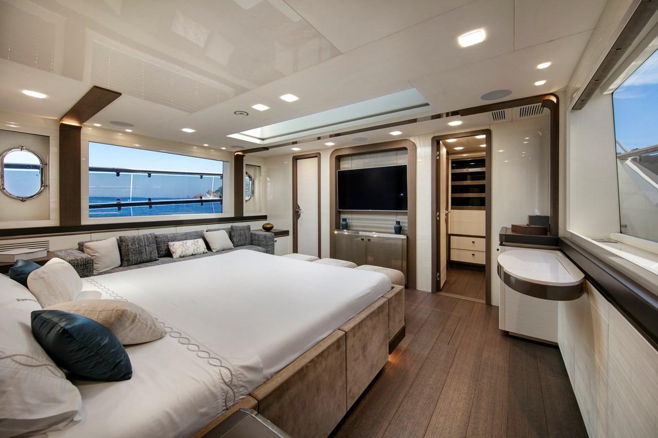a large bedroom with a large bed aboard ESMERALDA OF THE SEAS Yacht for Sale