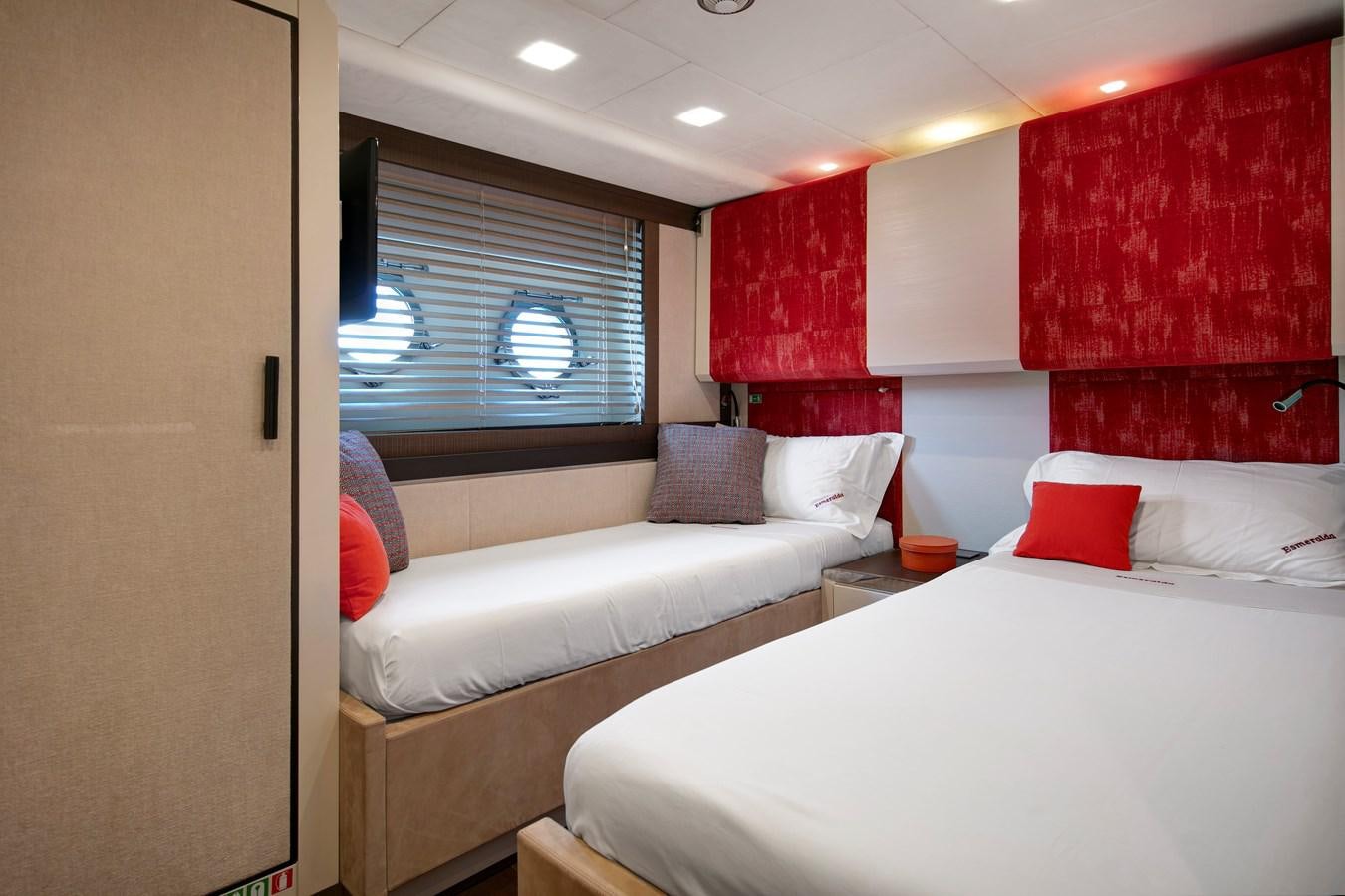 a room with two beds aboard ESMERALDA OF THE SEAS Yacht for Sale