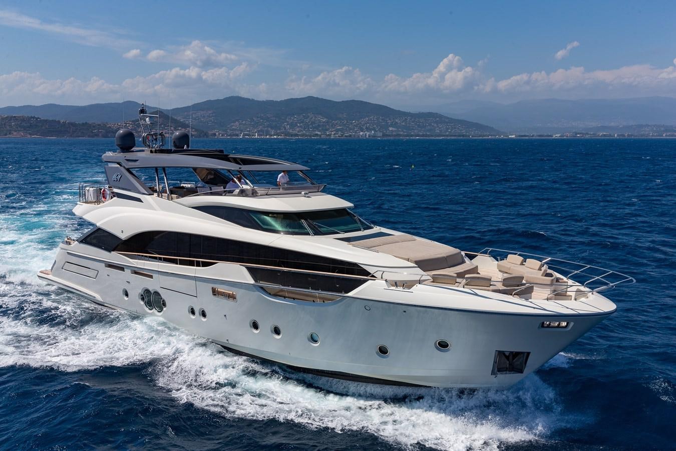 a white yacht on the water aboard ESMERALDA OF THE SEAS Yacht for Sale