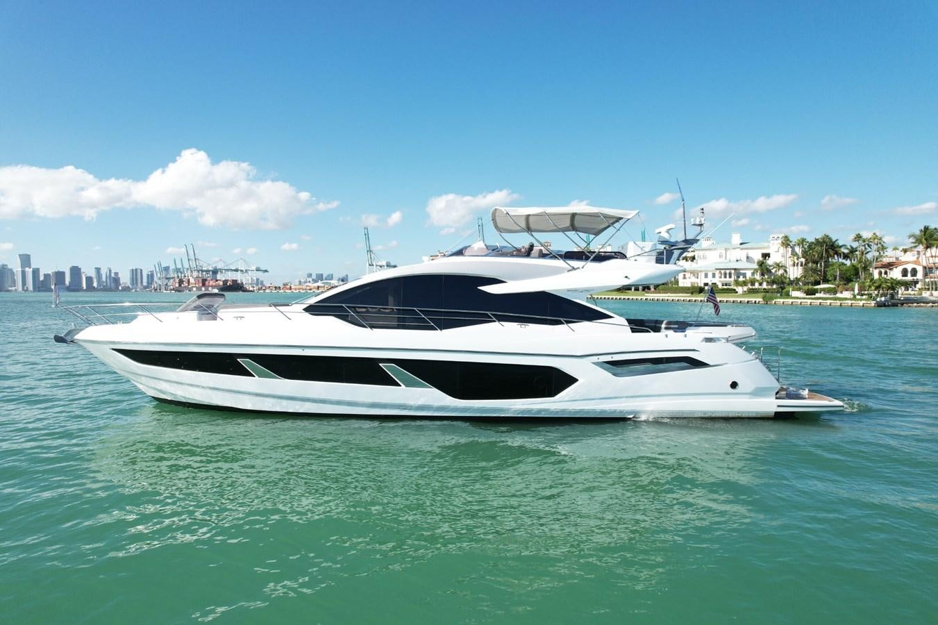 a white yacht in the water aboard HIDE OUT Yacht for Sale