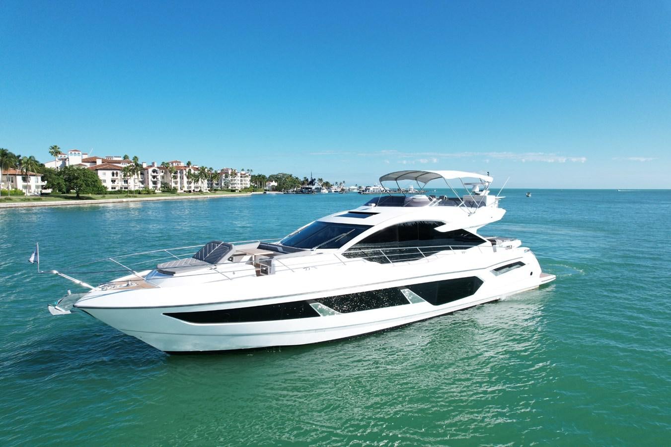 a white yacht in the water aboard HIDE OUT Yacht for Sale