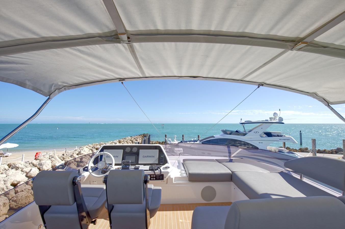 a boat is parked on the beach aboard HIDE OUT Yacht for Sale