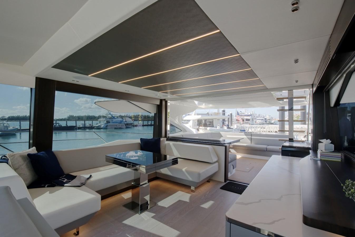 a room with a large window and a view of the city aboard HIDE OUT Yacht for Sale