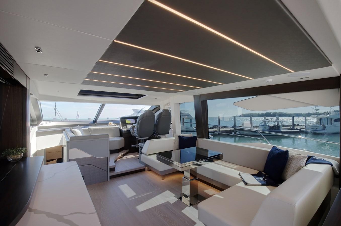 a room with a view of the ocean and the deck aboard HIDE OUT Yacht for Sale