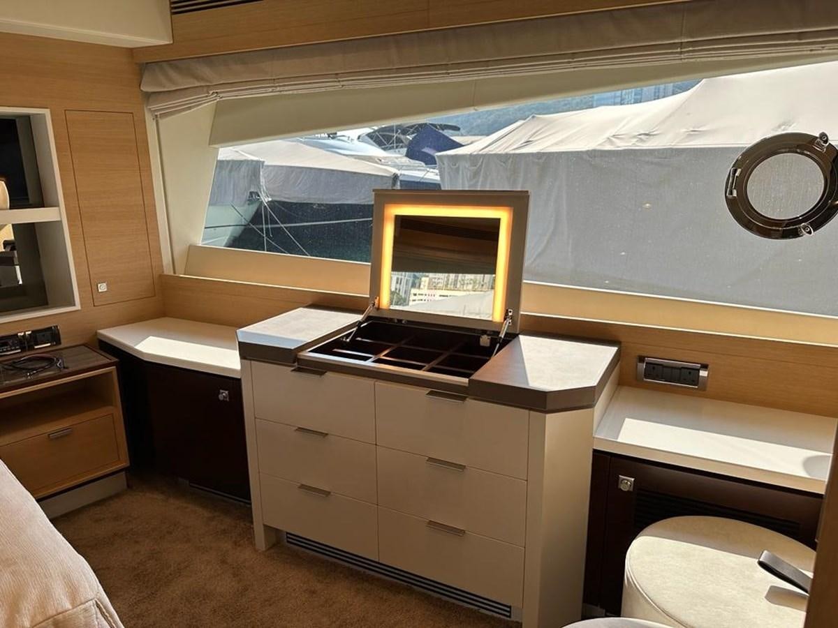 a laptop on a desk aboard BLACK SOIL Yacht for Sale