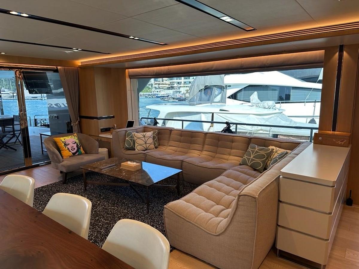 a living room with a large window aboard BLACK SOIL Yacht for Sale