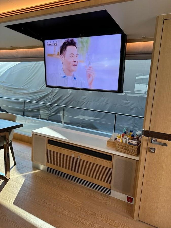 a tv on a wall aboard BLACK SOIL Yacht for Sale