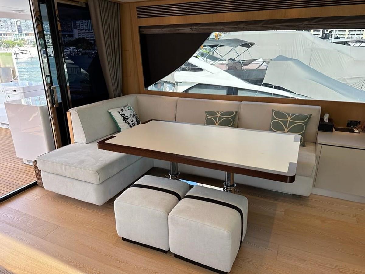 a couch in a room aboard BLACK SOIL Yacht for Sale