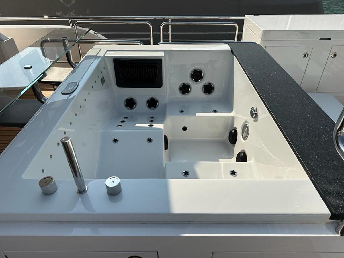 a white rectangular object with a black object on it aboard BLACK SOIL Yacht for Sale